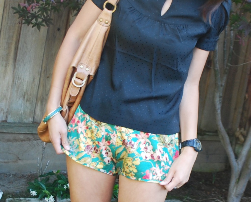 Tropical Silk Running Shorts and Black Dotted Blouse Outfit