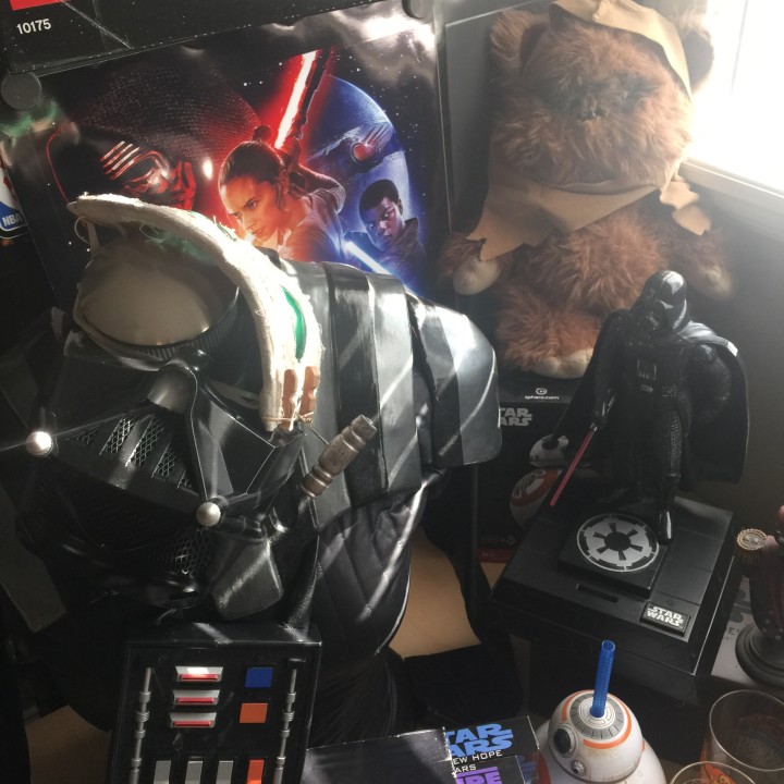 My original Ewok plush from the 80s, my Vader cosplay (with Rey goggles), vintage Vader coin bank (plays sound when you put in a coin!)