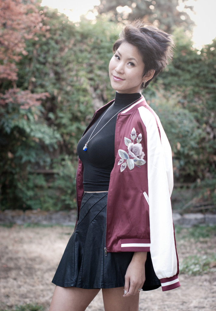 Floral bomber souvenir jacket with vegan leather skirt