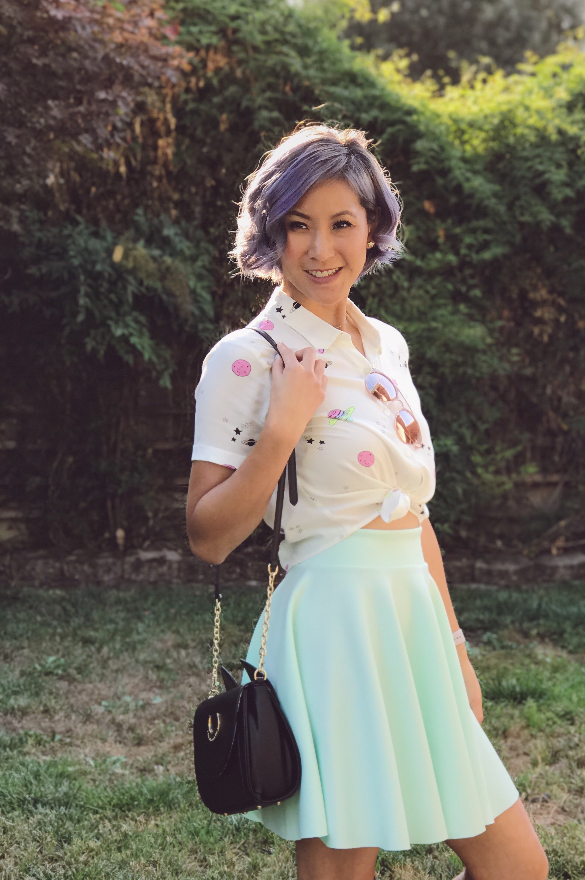 Galaxy print shirt and mint green skirt outfit